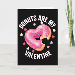 Süßes Herz-Donut mit rosa Frosting zum Valentinsta Karte