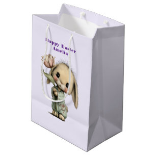 Süßes Kaninchen hält Ostertulpe Mittlere Geschenktüte