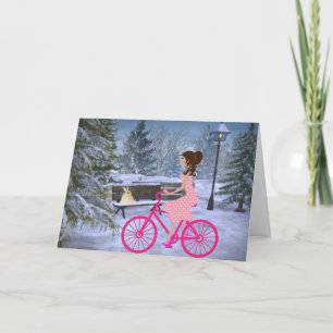 Süßes Mädchen auf einem rosa Fahrrad im Winter Karte