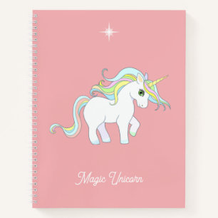 Süßes magisches Einhorn auf korallenrosa Notizbuch