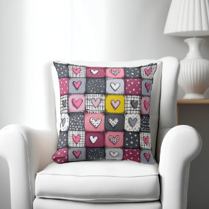 Süßes Patchworkmuster mit Herzen Kissen