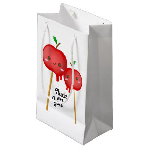 Süßigkeits-Äpfel fest auf Ihnen Kleine Geschenktüte