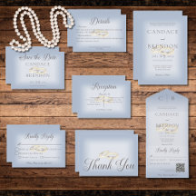 Gold Wedding Rings on Blue Wedding Suite Cards
