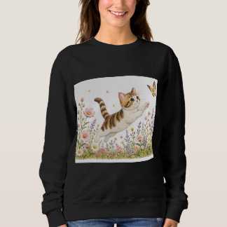 Sweatshirt Chat brodé poursuivant un papillon dans des fleurs