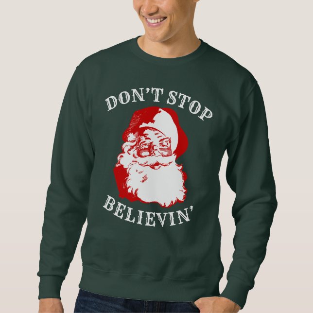 Sweatshirt drôle de Noël : "N'ARRÊTEZ PAS BELIEVIN (Devant)