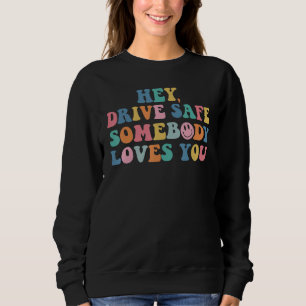Sweatshirt Hé Conduisez en toute sécurité Quelqu'un vous aime