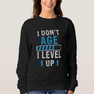 Sweatshirt Je ne vieillis pas, je monte de niveau Citation d