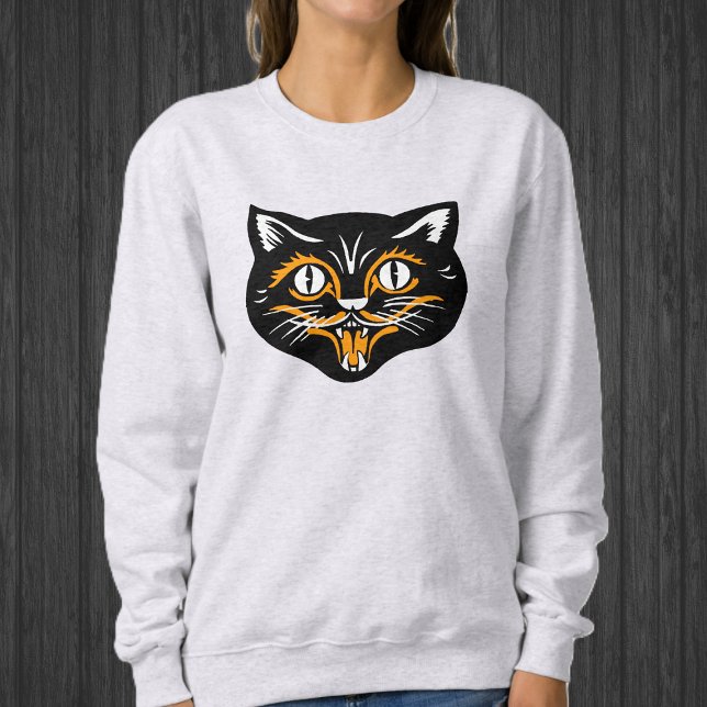 Sweatshirt Joyeux Halloween noir visage de chat avec blanc or (Happy Black cat face for Halloween with orange and white accents on sweatshirt.)