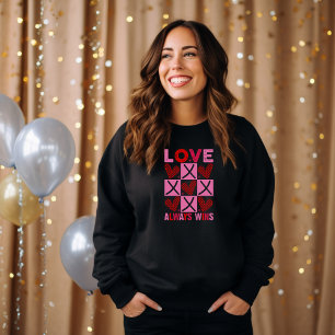 Sweatshirt L'amour gagne toujours rose Saint Valentin Noir