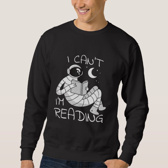 Sweatshirt L'astronaute Lit Un Ver De Livre (Devant)
