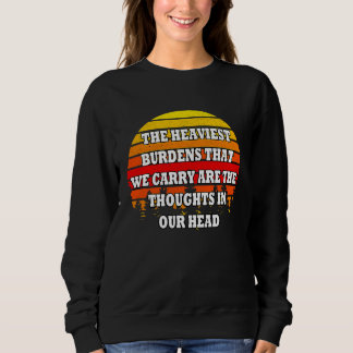 Sweatshirt Les charges les plus lourdes que nous portons ... 