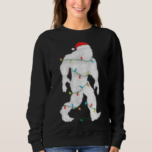 Sweatshirt Père Noël Yeti Tangée Dans Les Lumières Des Arbres