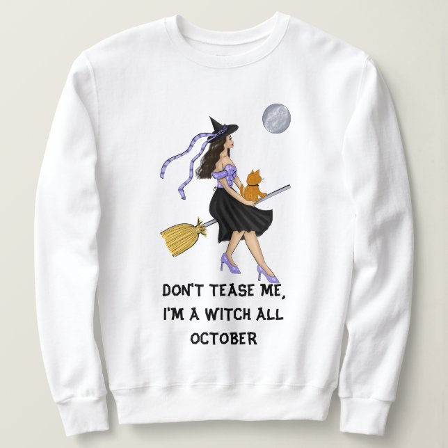 Sweatshirt Sorcière avec un chat orange sur un Broomstick (Design devant)
