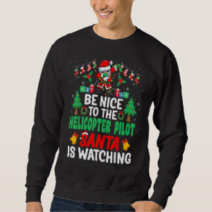 Sweatshirt Soyez gentil avec la Père Noël pilote d'hélicoptèr