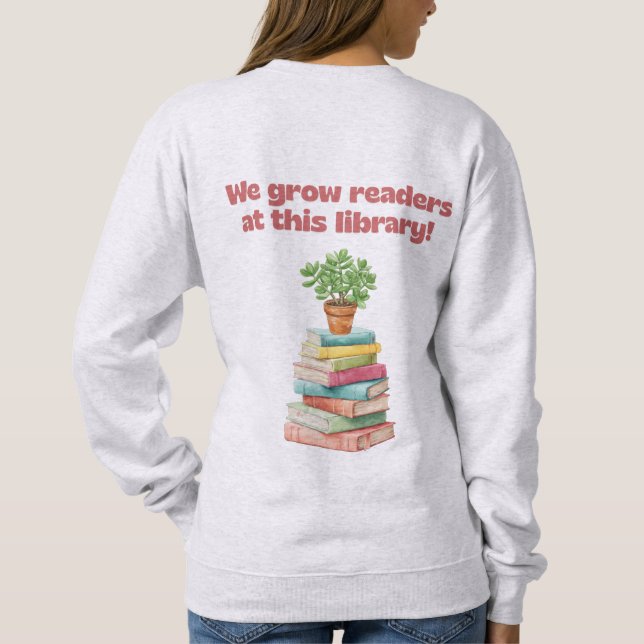 Sweatshirt We Grow Readers at this Library (Dos)