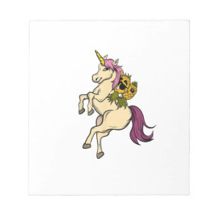 Swingers Paar Ananas, die auf einem Einhorn schwin Notizblock