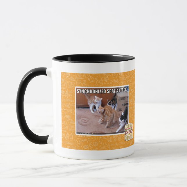 Sychronized Spaz Angriff Tasse (Links)