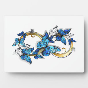 Symbol Unendlichkeit von blauen Morpho-Schmetterli Fotoplatte