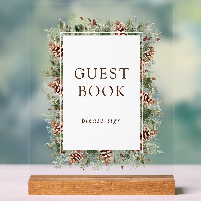 Symbole acrylique du livre d'hiver (Watercolor Pine Greenery Winter Guest Book Acrylic Sign by Painted Paperie)