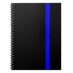 Symbolische dünne Blue Line auf Schwarzem Notizblock