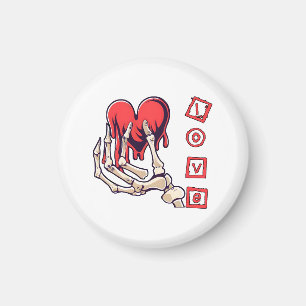 Symbolische Liebesskelett-Hand, die Herz anbietet Magnet