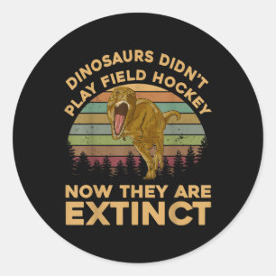 T-Rex-Dinosaurier spielten kein Feldhockey Jetzt s Runder Aufkleber