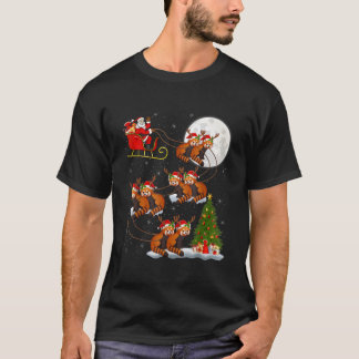 T-shirt Arbre lumineux avec le Père Noël chevauchant un pa