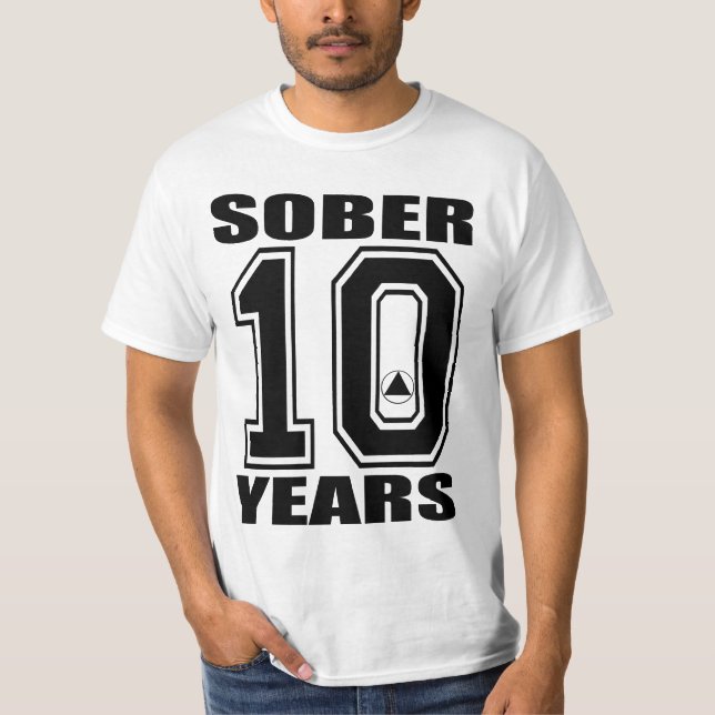 T-shirt Assagissez 10 ans noircissent sur le blanc, (Devant)