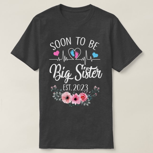 T-shirt Bientôt Être Grande Soeur Est 2023 Grossesse Flora (Design devant)