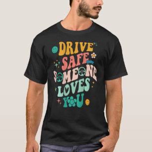 T-shirt Conduisez en toute sécurité Quelqu'un vous aime Ci