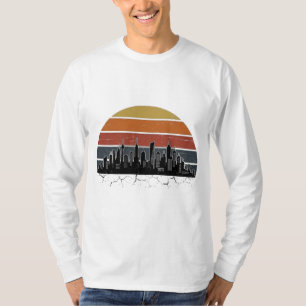 T-shirt Coucher de soleil sur la skyline de la ville rétro