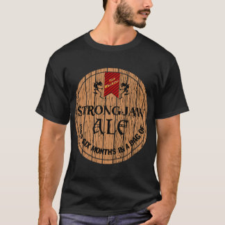 T-shirt critique rôle merch strong jaw ale
