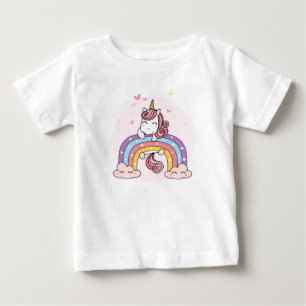 T - SHIRT DER KINDER: UNICORN AUF EINEM RAINBODEN