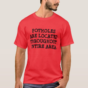 T-SHIRT DES NIDS DE POULE SONT SITUÉS DANS TOUT LE SECTEU