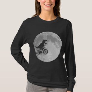 T-shirt Dinosaure sur un vélo dans le ciel avec la lune
