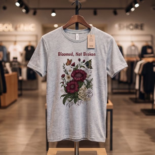 T-shirt floral inspirant "Épanoui, pas brisé"