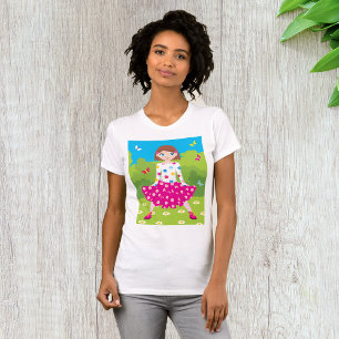 T-shirt Heureuse petite fille avec des fleurs et des papil
