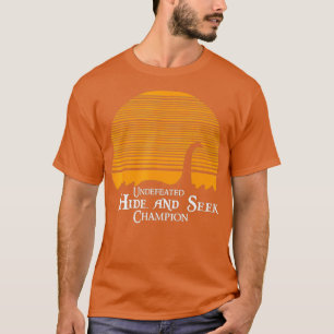 T-shirt Indéfectible Cacher et Chercher la Lochness Champ