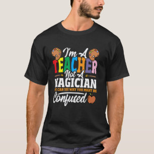 T-shirt Je suis un professeur, pas un magicien, mais je pe