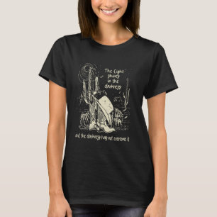 T-shirt La lumière brille dans l'obscurité Bottes et chape