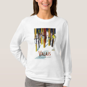T-shirt La terre du soleil - skis se tenant dans la neige