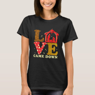 T-shirt L'amour est tombé Nativité Noël Bébé Jésus Mange