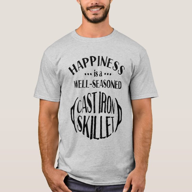 T-shirt Le bonheur de fer de fonte est une poêle bien (Devant)