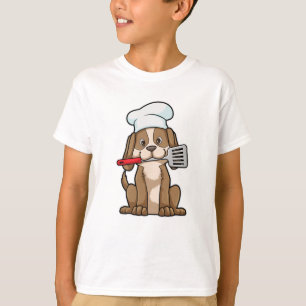 T-shirt Le chien cuisinier avec le casquette et la spatule