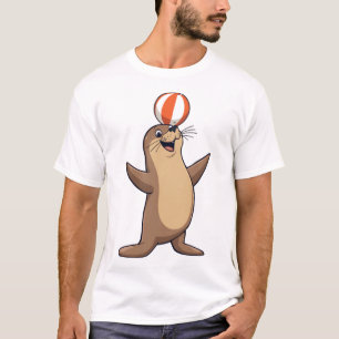 T-shirt Lion de mer de dessin animé joueur avec ballon de