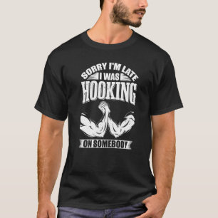 T-shirt Lutte manuelle de la main Lutte contre le bras et 