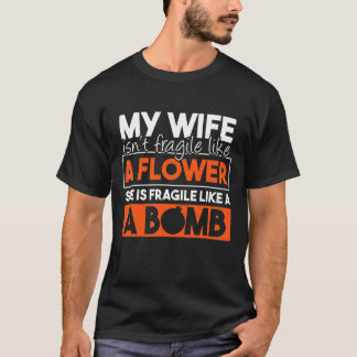 T-shirt Ma femme n'est pas fragile comme une fleur elle es