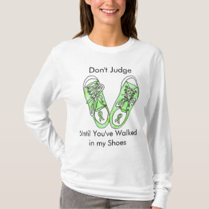 T-shirt Ne jugez pas jusqu'à ce que vous ayez marché dans