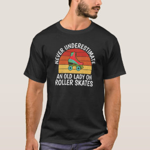 T-shirt N'estimez jamais une vieille dame en patins à roul