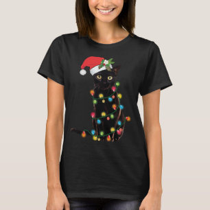 T-shirt Père Noël Chat Noir Tangé Dans La Lumière De L'Arb